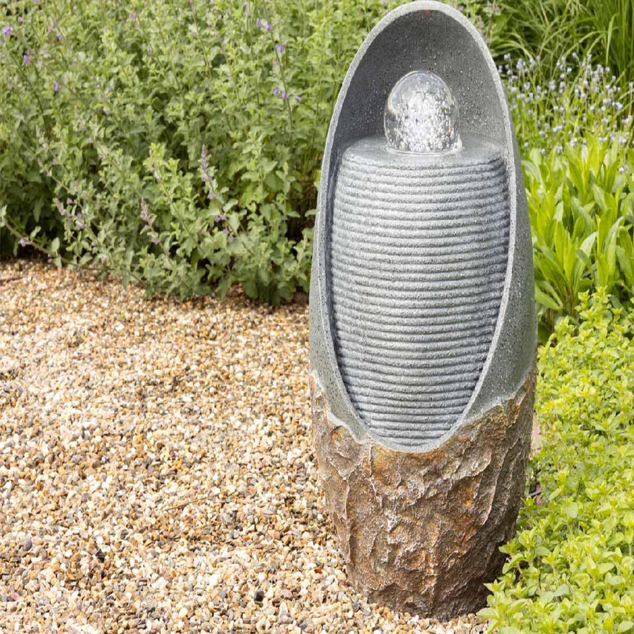 Voir la diapositive 2 : JARDIDECO Fontaine extérieure ovale effet pierre avec LED - Jardideco