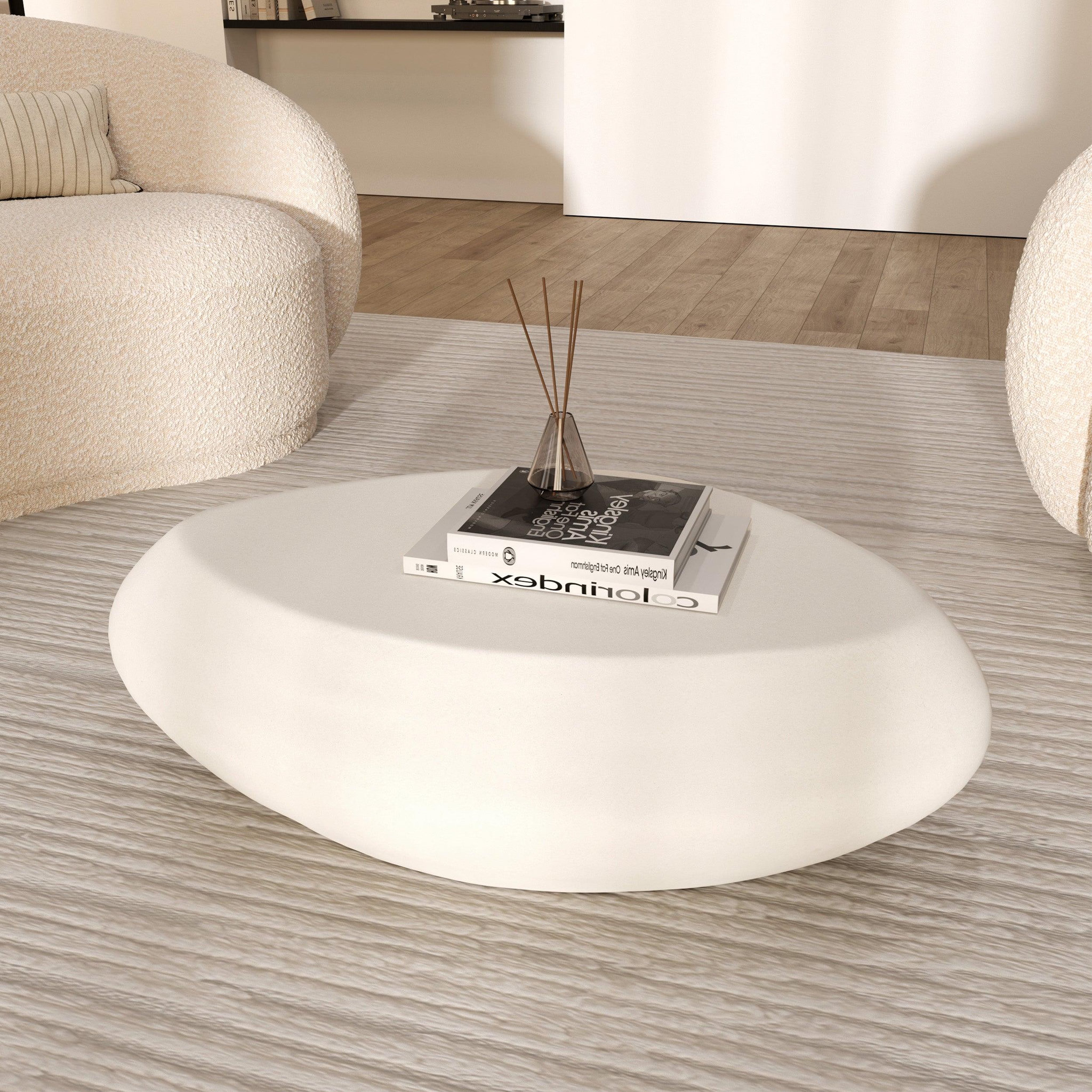 Voir la diapositive 6 : MAISON PAVANE Table basse ovale blanche en fibre d'argile effet béton 105 cm-maui