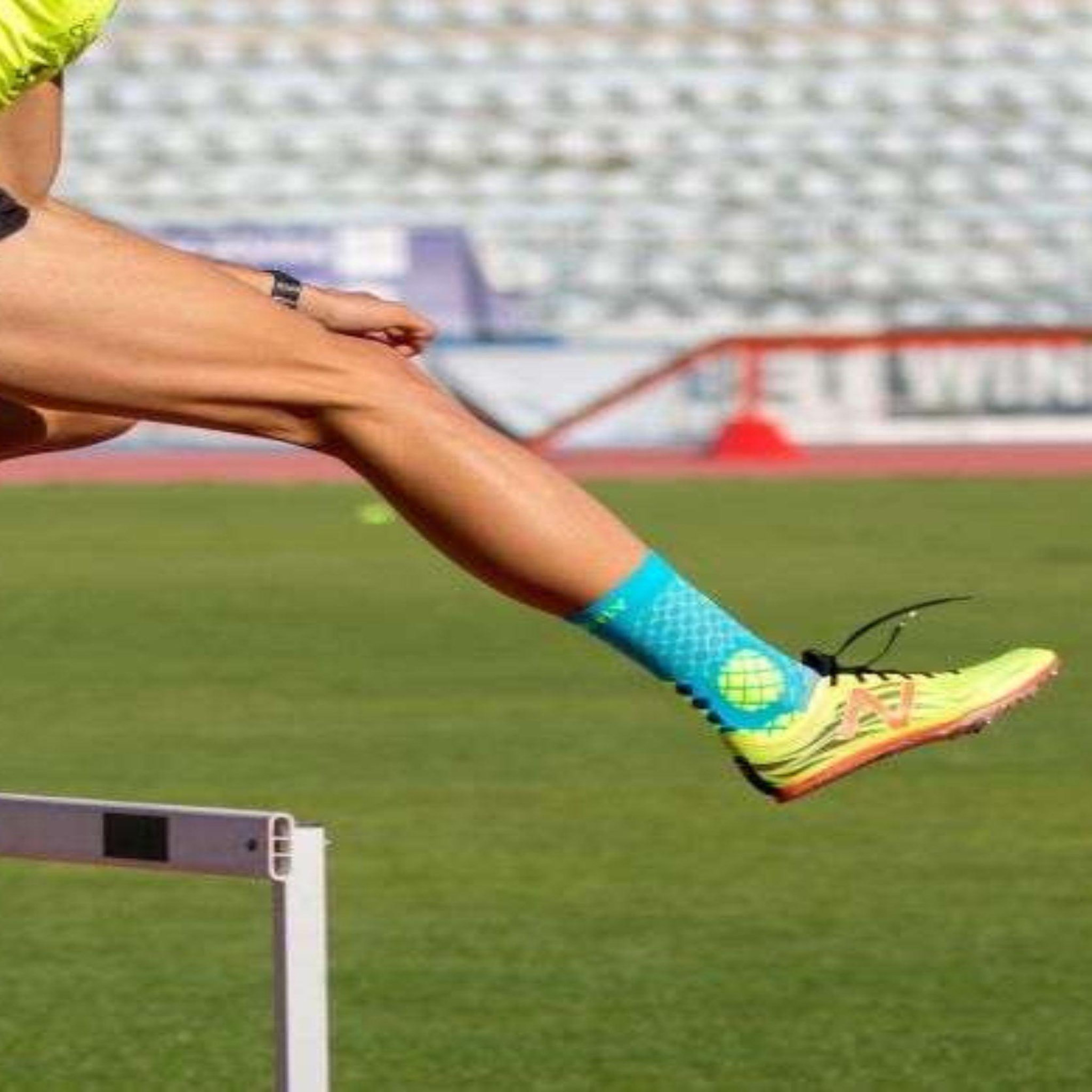 Voir la diapositive 2 : TRY TO FLY Chaussettes compression turquoise & jaune