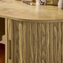 Voir la diapositive 5 : SWEEEK Bureau ovale effet bois rainuré avec deux espaces de rangement. L 120 x P 55 x H 77 cm