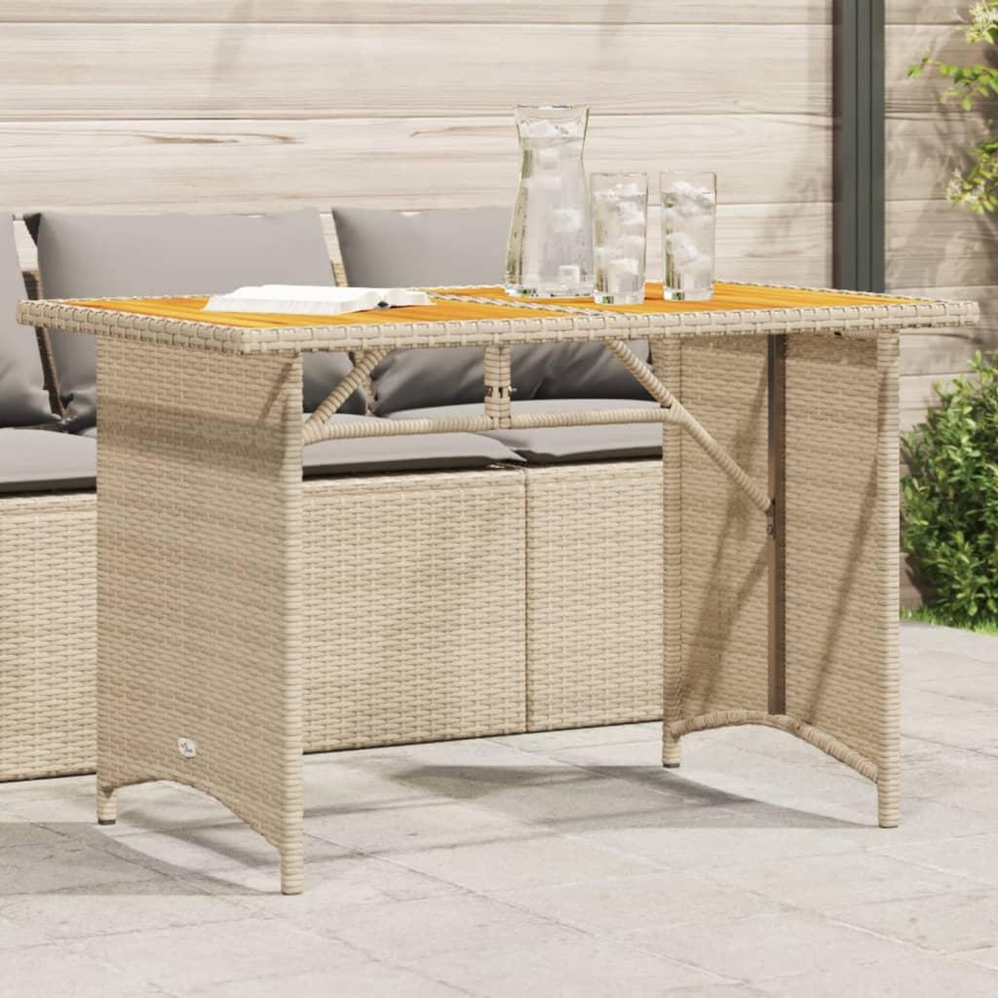 VIDAXL Table de jardin avec dessus en bois noir 110x68x70 cm rotin