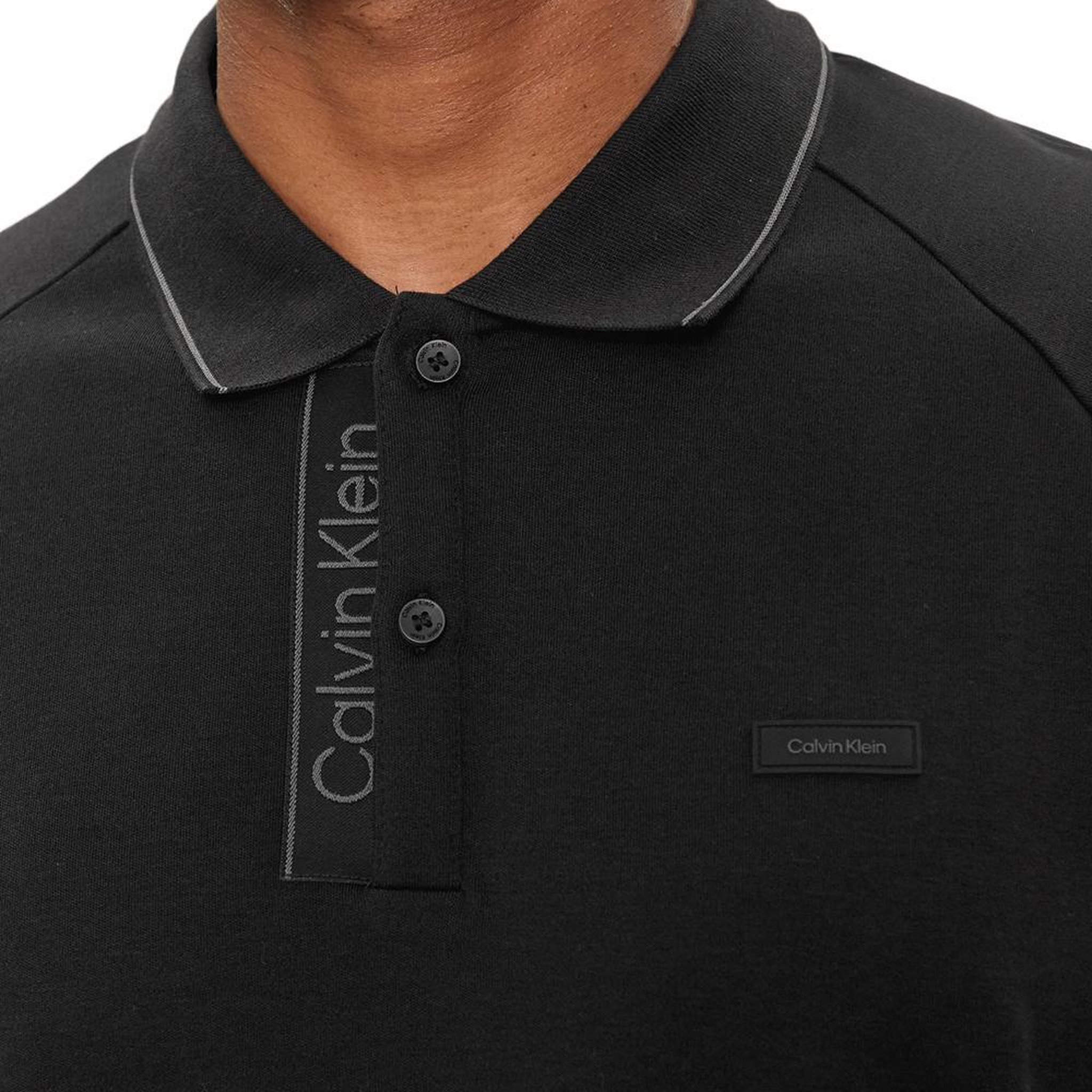 Voir la diapositive 4 : CALVIN KLEIN JEANS Polo Noir Homme Calvin Klein Jeans K10K112463