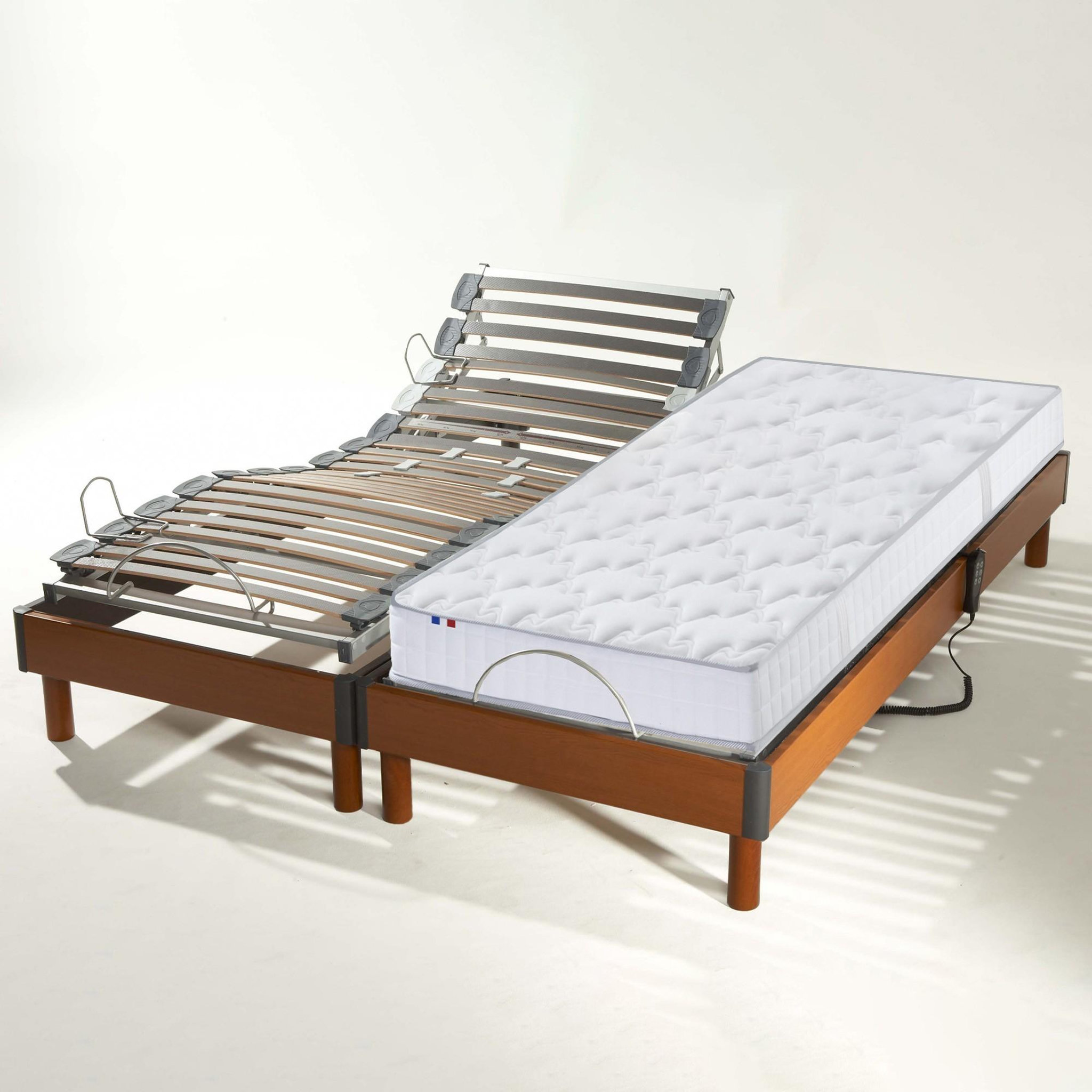 Voir la diapositive 2 : IDLITERIE Ensemble relaxation ressorts + sommier avec réglage fermeté au niveau lombaire 2x80x200