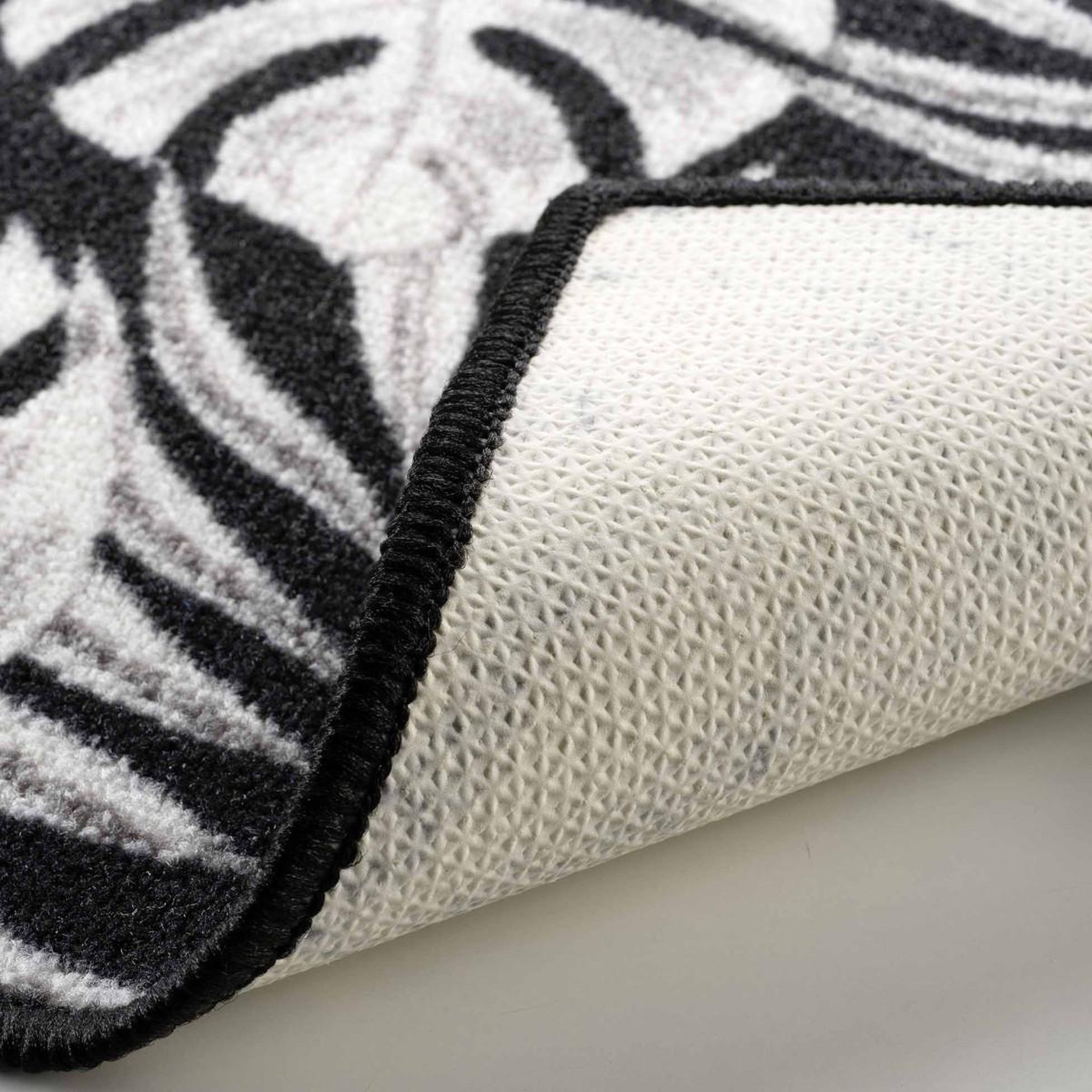 Voir la diapositive 3 : Douceur d'Intérieur Tapis imprimé  amber  50x120cm noir