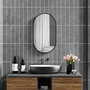 Voir la diapositive 4 : HOMCOM Miroir mural ovale dim. 40L x 70H cm cadre arrondi montage vertical/horizontal alu. noir