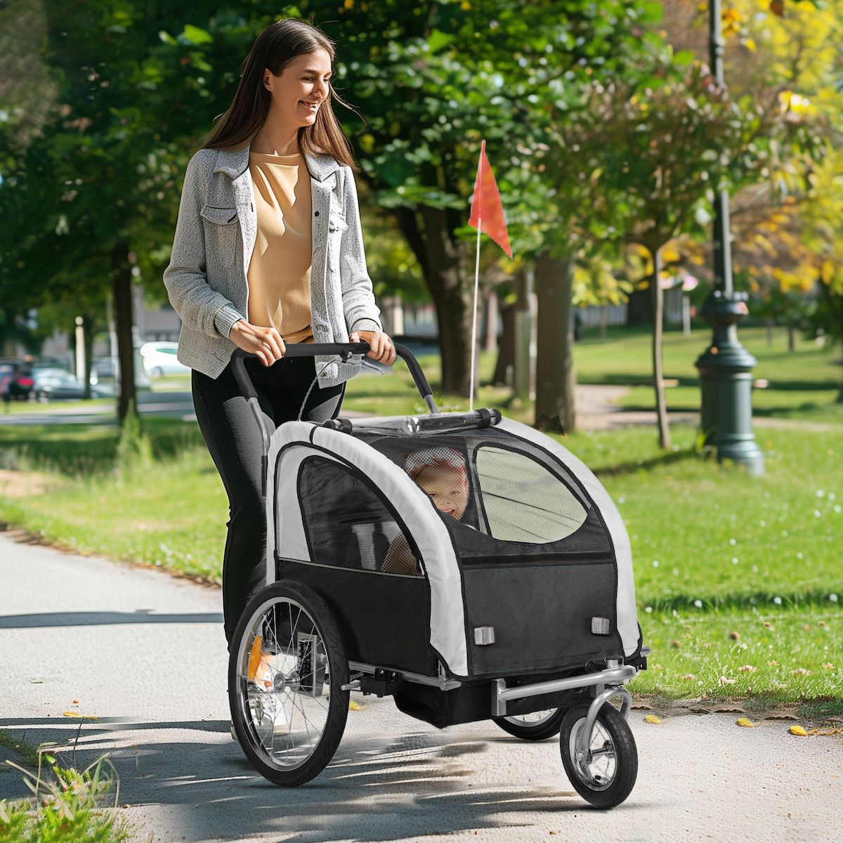 HOMCOM Remorque vélo jogger 2 en 1 enfant drapeau roue avant pivotante réflecteurs barre d'attelage inclus noir blanc