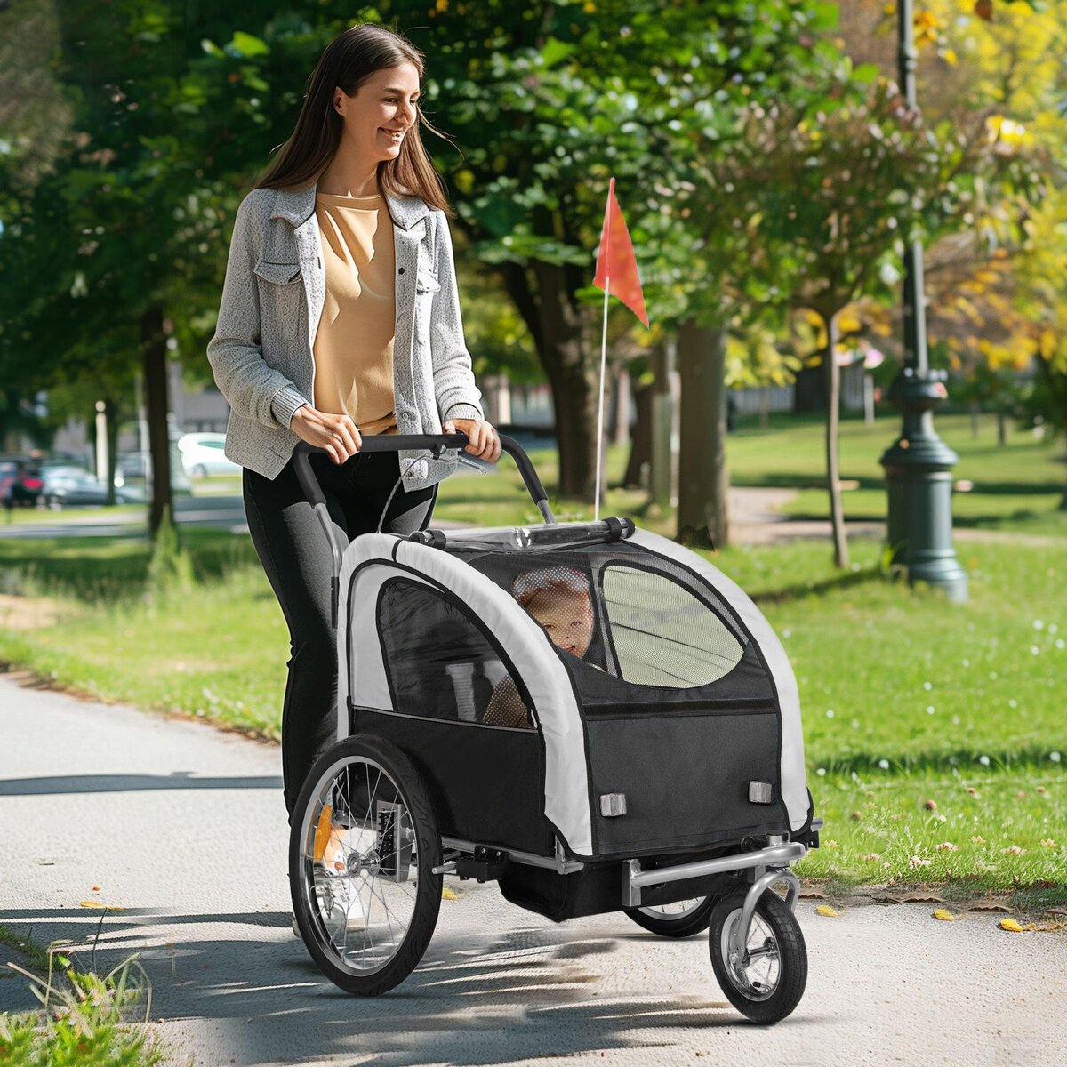 HOMCOM Remorque vélo jogger 2 en 1 enfant drapeau roue avant pivotante réflecteurs barre d'attelage inclus noir blanc