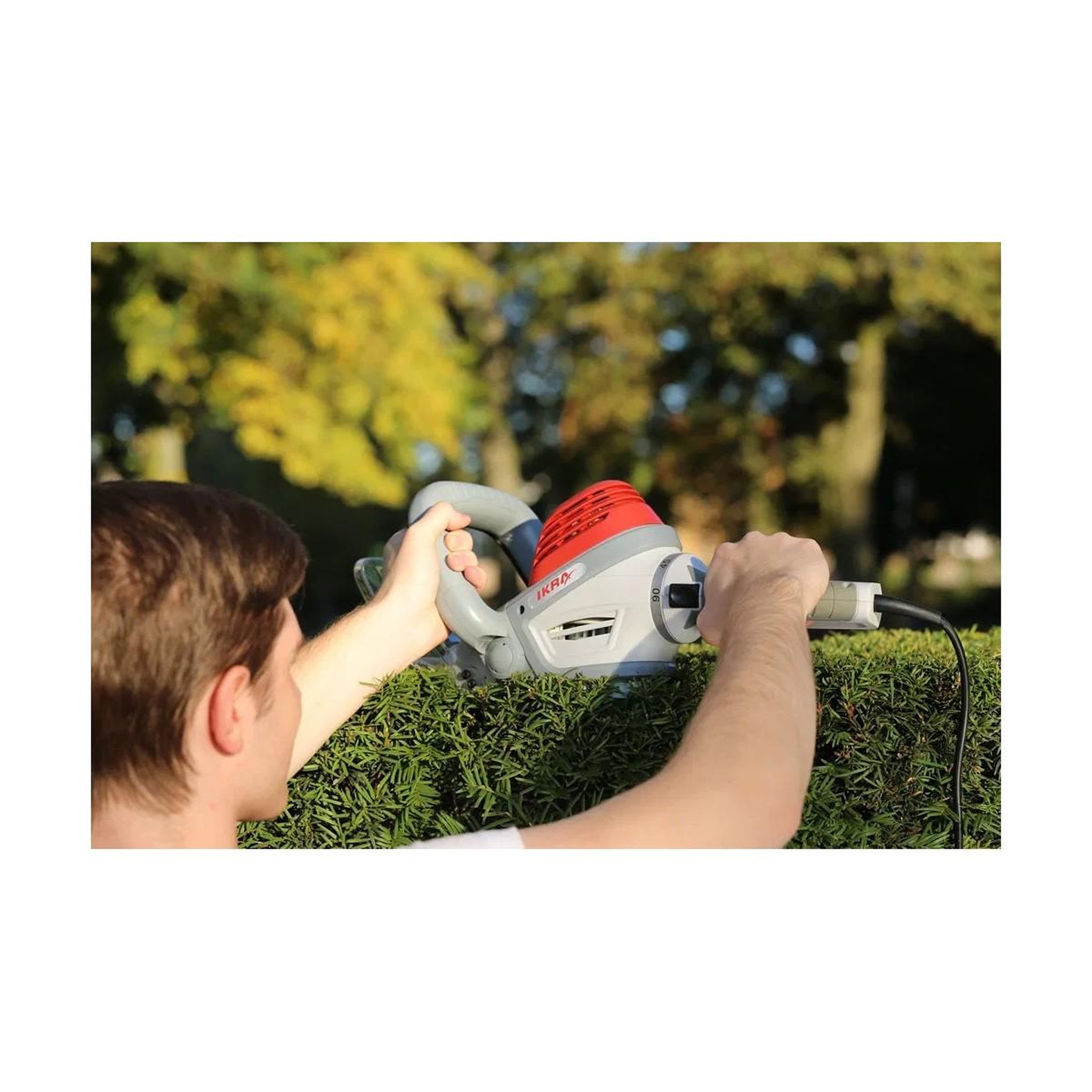 Voir la diapositive 5 : Ikra Taille-haie électrique 600w double lame 55 cm poignée ergonomique pivotante frein électrique ikra