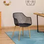 IDIMEX Lot de 4 chaises LUCIA pour salle à mange design retro avec accoudoirs, coque en plastique noir et pieds en métal décor chêne