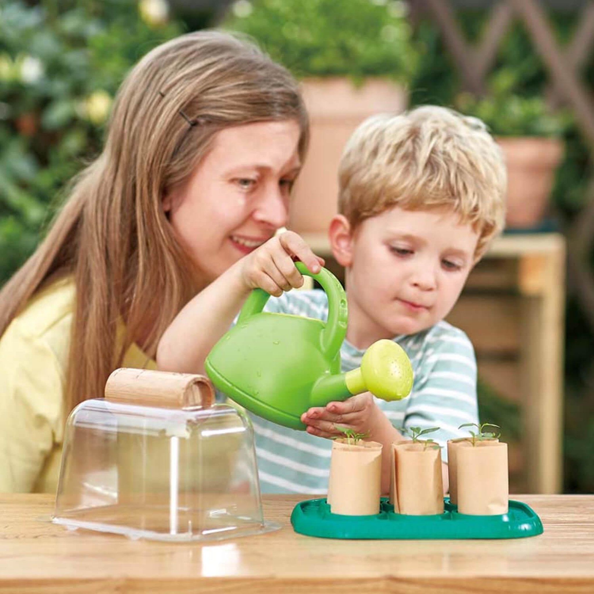 Voir la diapositive 4 : Hape Serre pour apprentis jardiniers
