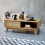 Voir la diapositive 3 : SWEEEK Table basse avec 2 niches. 1 porte coulissante. effet bois et cannage. pieds eucalyptus