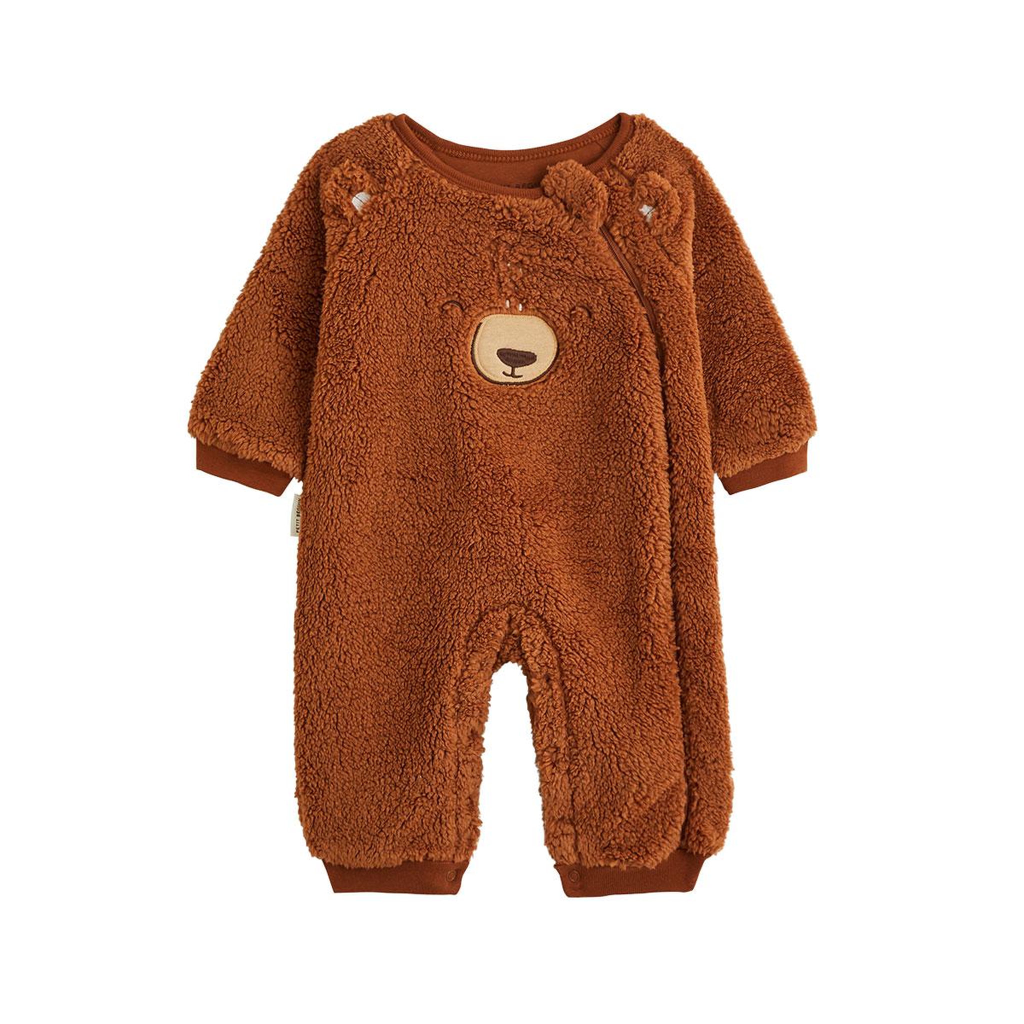 PETIT BEGUIN Surpyjama bébé en sherpa moka. Coloris disponibles : Marron