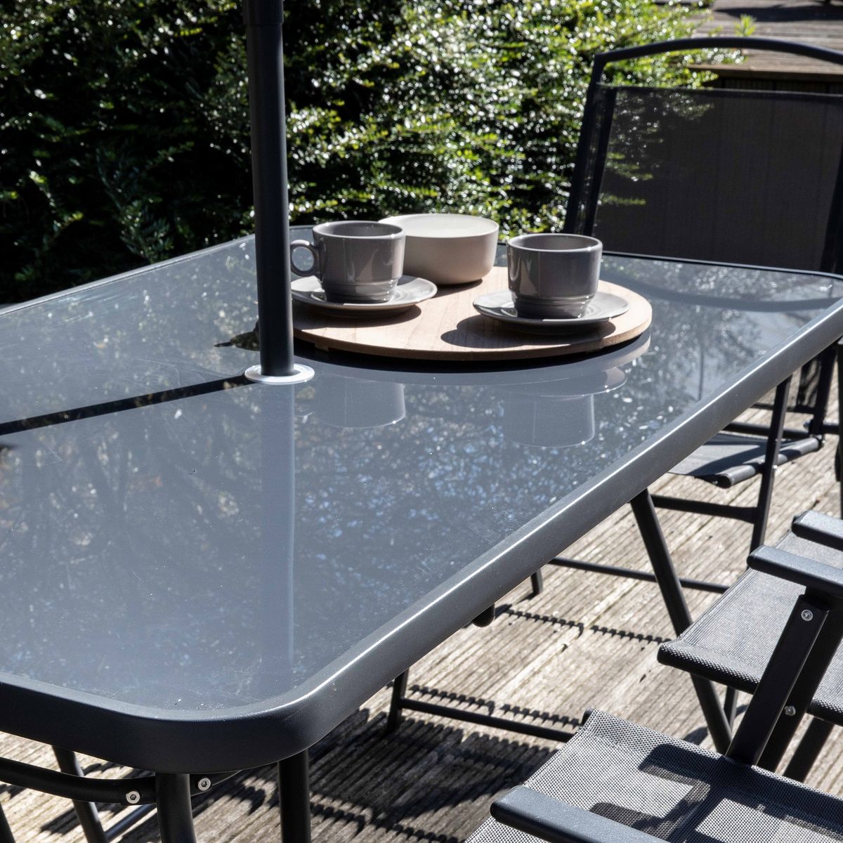 Oviala Salon  de jardin avec parasol - 6 places - Résine et verre - BORMES