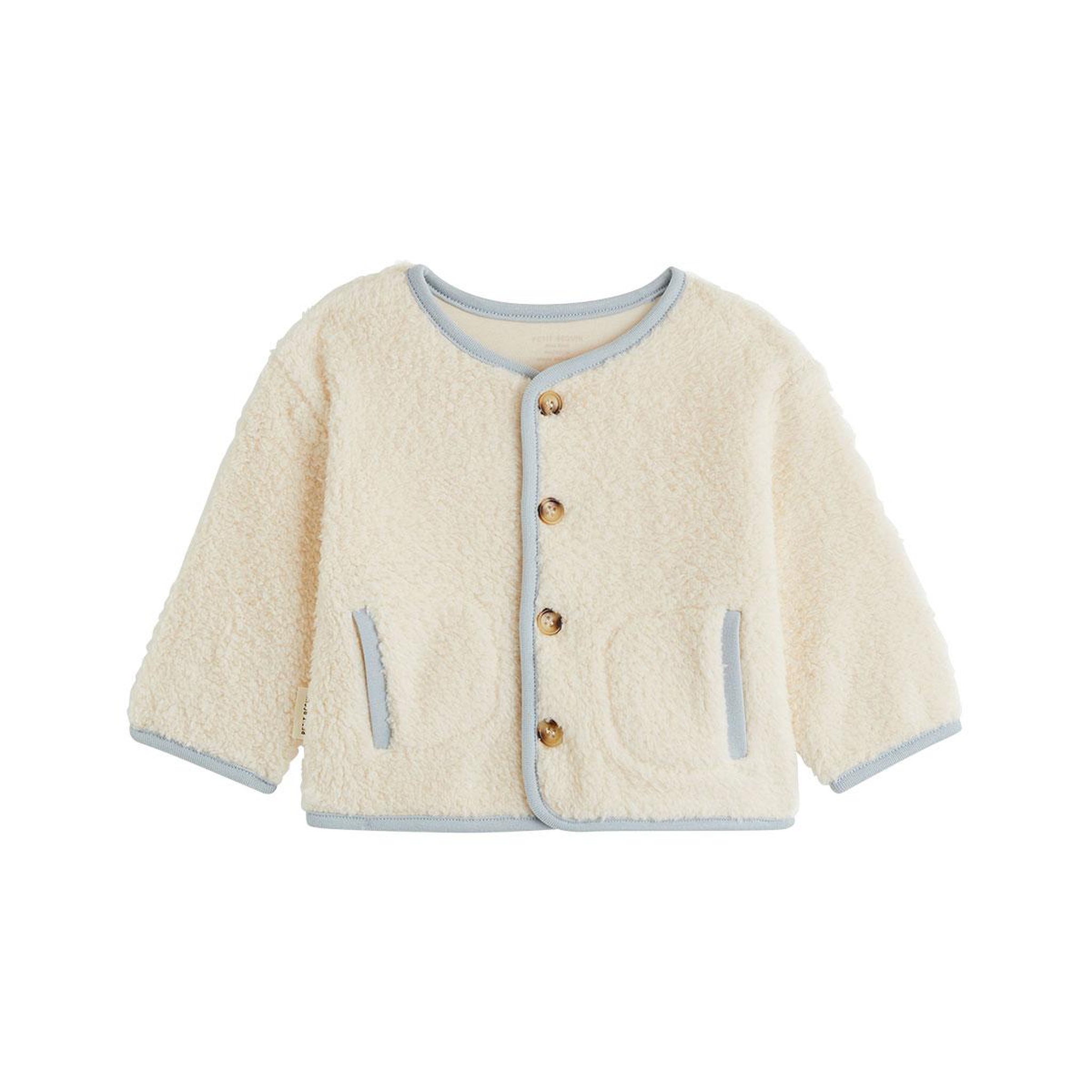 PETIT BEGUIN Veste bébé en sherpa voix lactée. Coloris disponibles : Beige