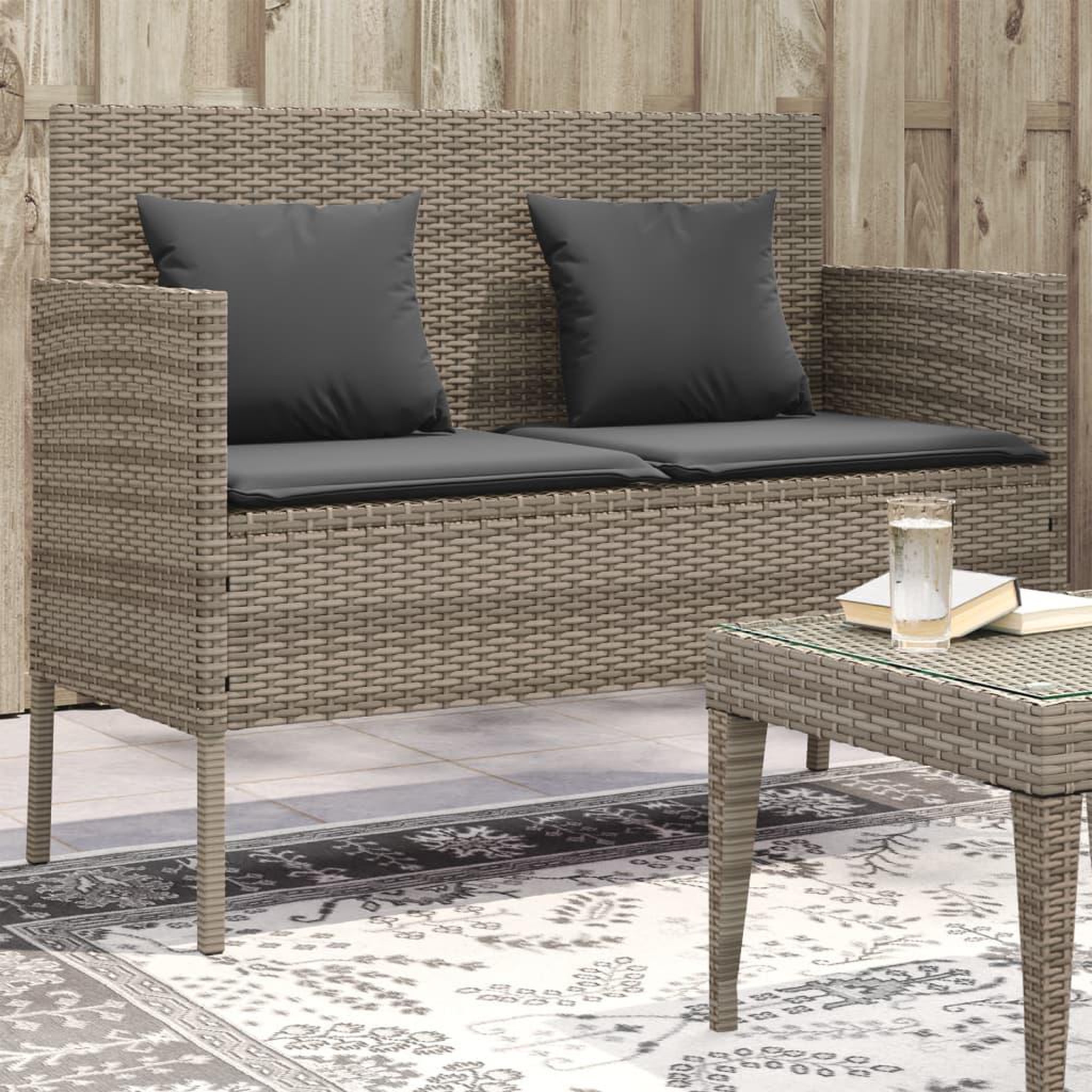 VIDAXL Banc de jardin avec coussins gris resine tressee