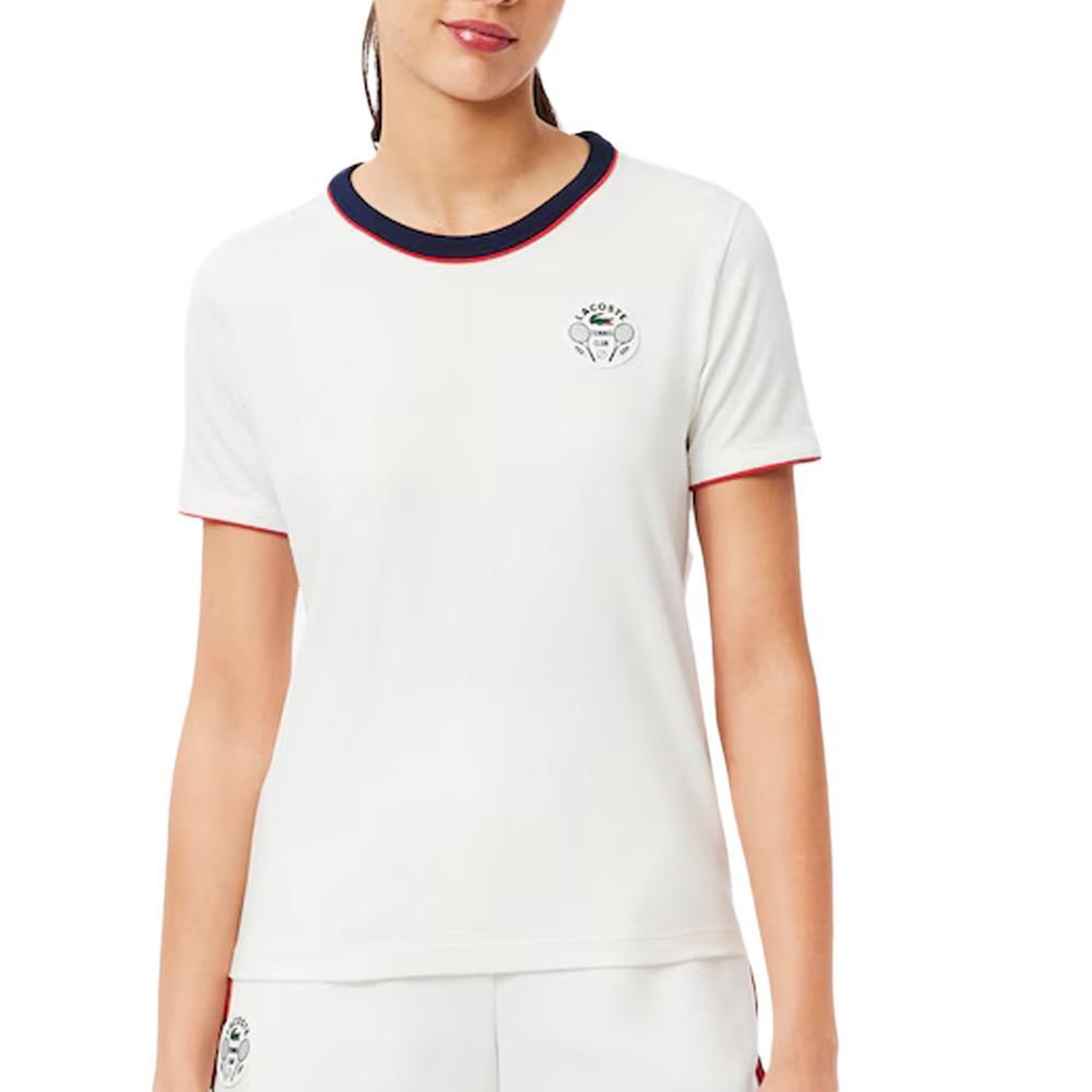 Lacoste T shirt  Femme Lacoste Ultra Dry Heritage Badge. Coloris disponibles : Blanc
