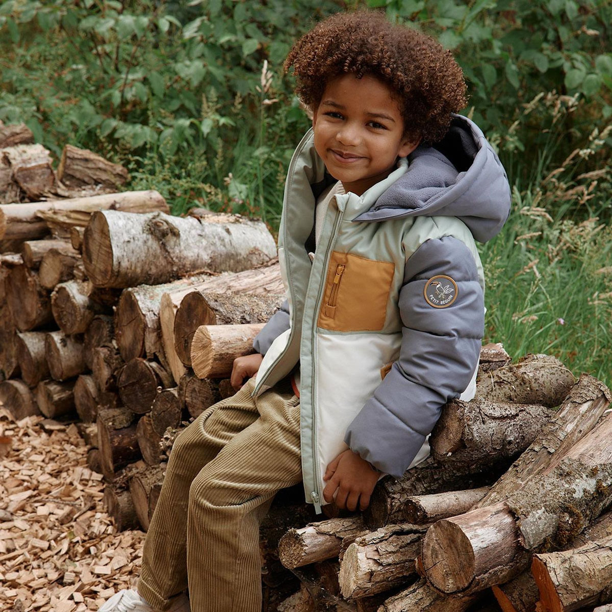 Petit Béguin Doudoune enfant imperméable doublée polaire avec capuche Boavista