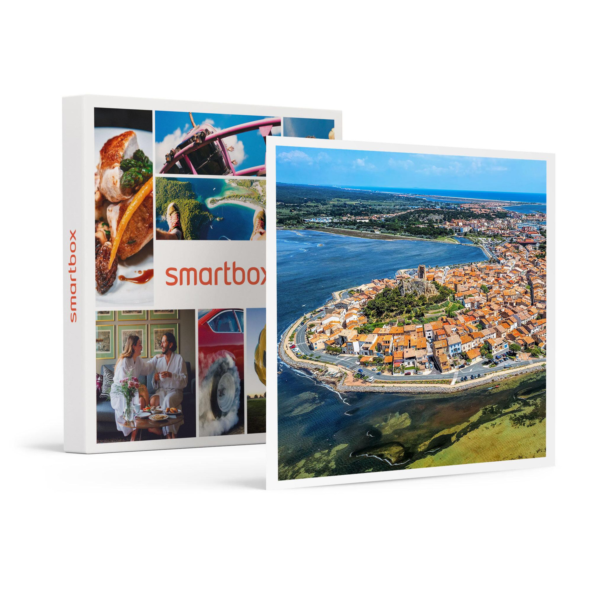 Voir la diapositive 1 : Smartbox Vol en hélicoptère de 20 min près du village de Gruissan - Coffret Cadeau Sport & Aventure