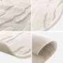 Voir la diapositive 3 : SWEEEK Tapis intérieur forme de galet motif avec relief beige Julianne 160x230cm