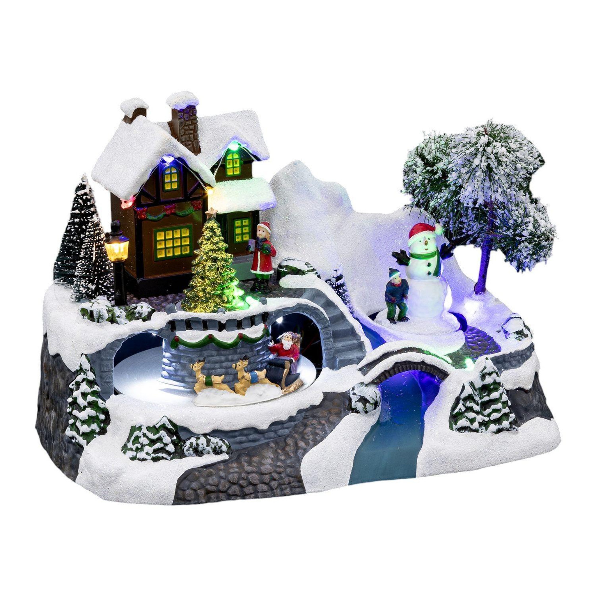 FEERIC LIGHT & CHRISTMAS Village de noel enneigé avec le père noel - hauteur 23,8 cm - marron, blanc et bleu