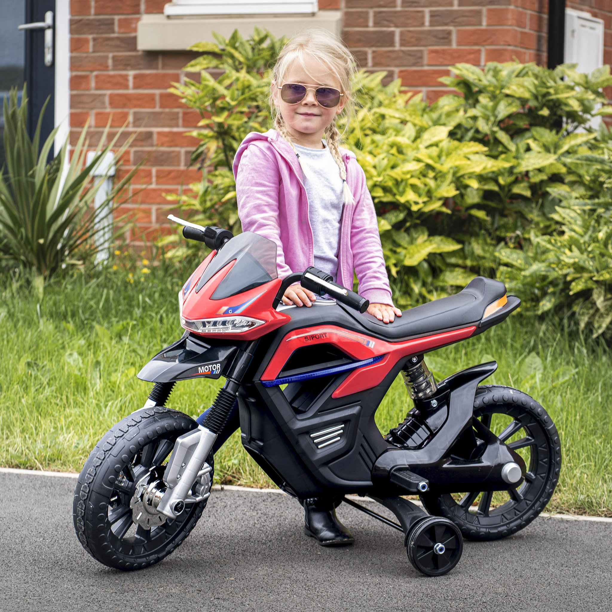 Voir la diapositive 2 : HOMCOM Moto électrique pour enfants 25 W 6 V 3 Km/h effets lumineux et sonores roulettes amovibles rouge