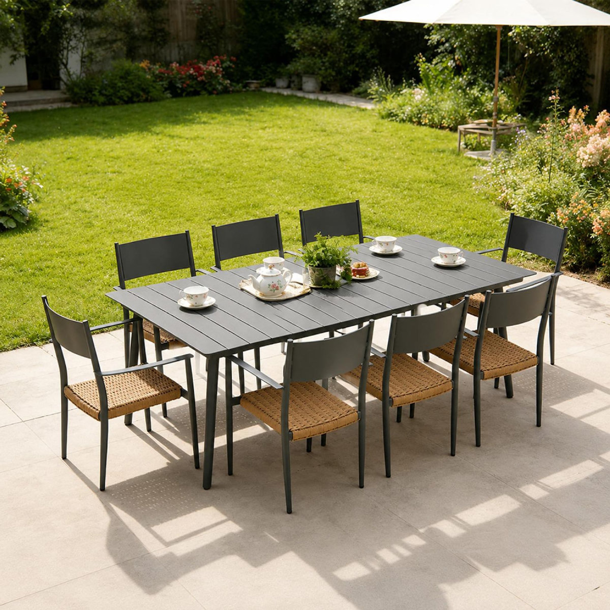 CONCEPT USINE Ensemble table de jardin 200 cm et 8 fauteuils gris foncé effet rotin CANBERRA