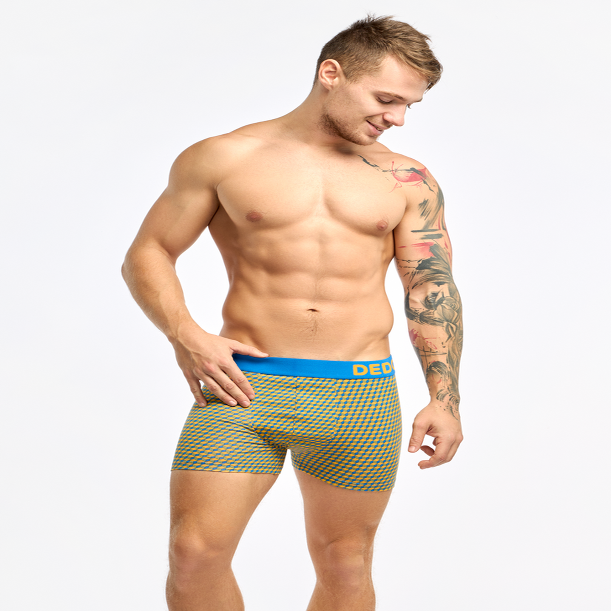 Voir la diapositive 2 : DEDOLES Boxer homme motif jacquard bleu & jaune