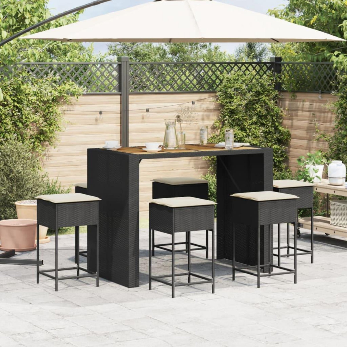 VIDAXL Ensemble de bar de jardin 7 pcs avec coussins noir poly rotin