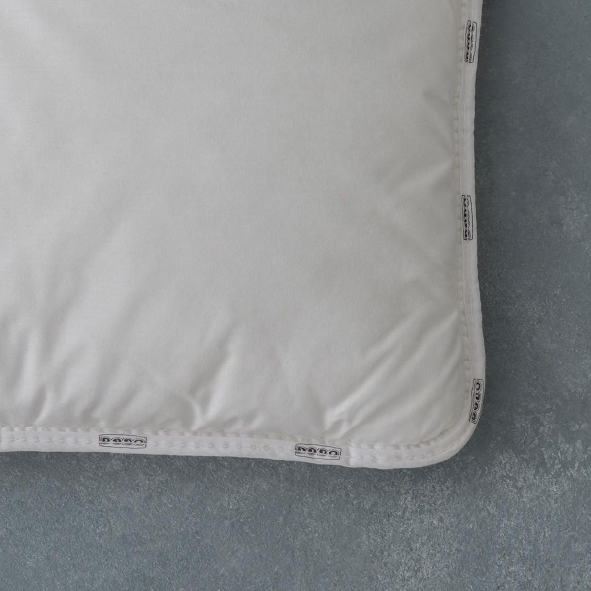 DODO Surmatelas Highperformance luxueux Anti-Acariens