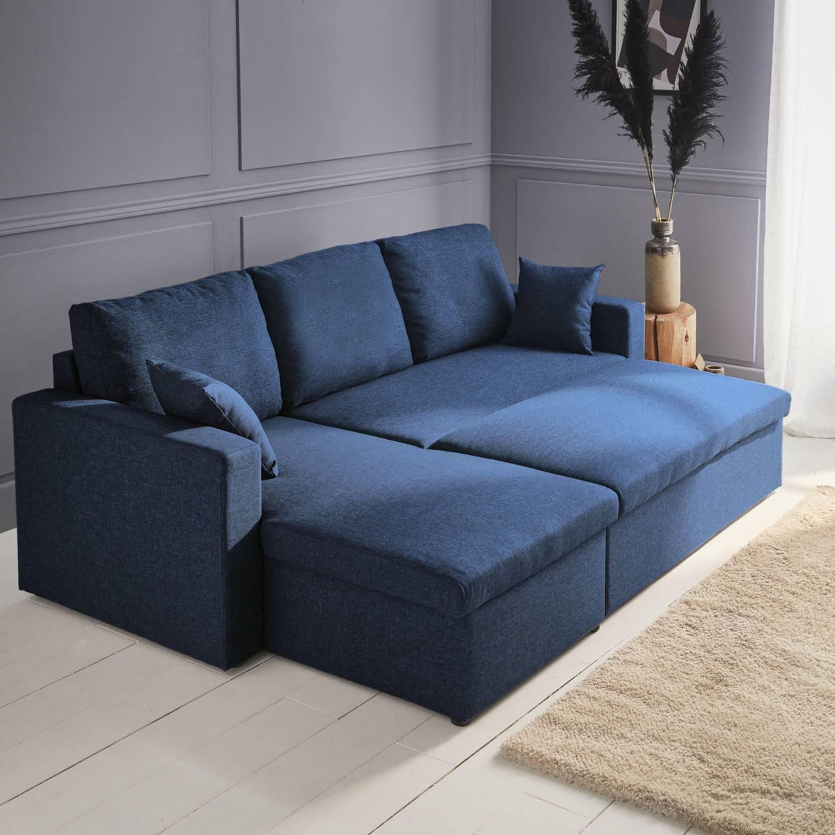 SWEEEK Canapé d'angle convertible en tissu bleu - IDA - 3 places. fauteuil d'angle réversible coffre rangement lit modulable