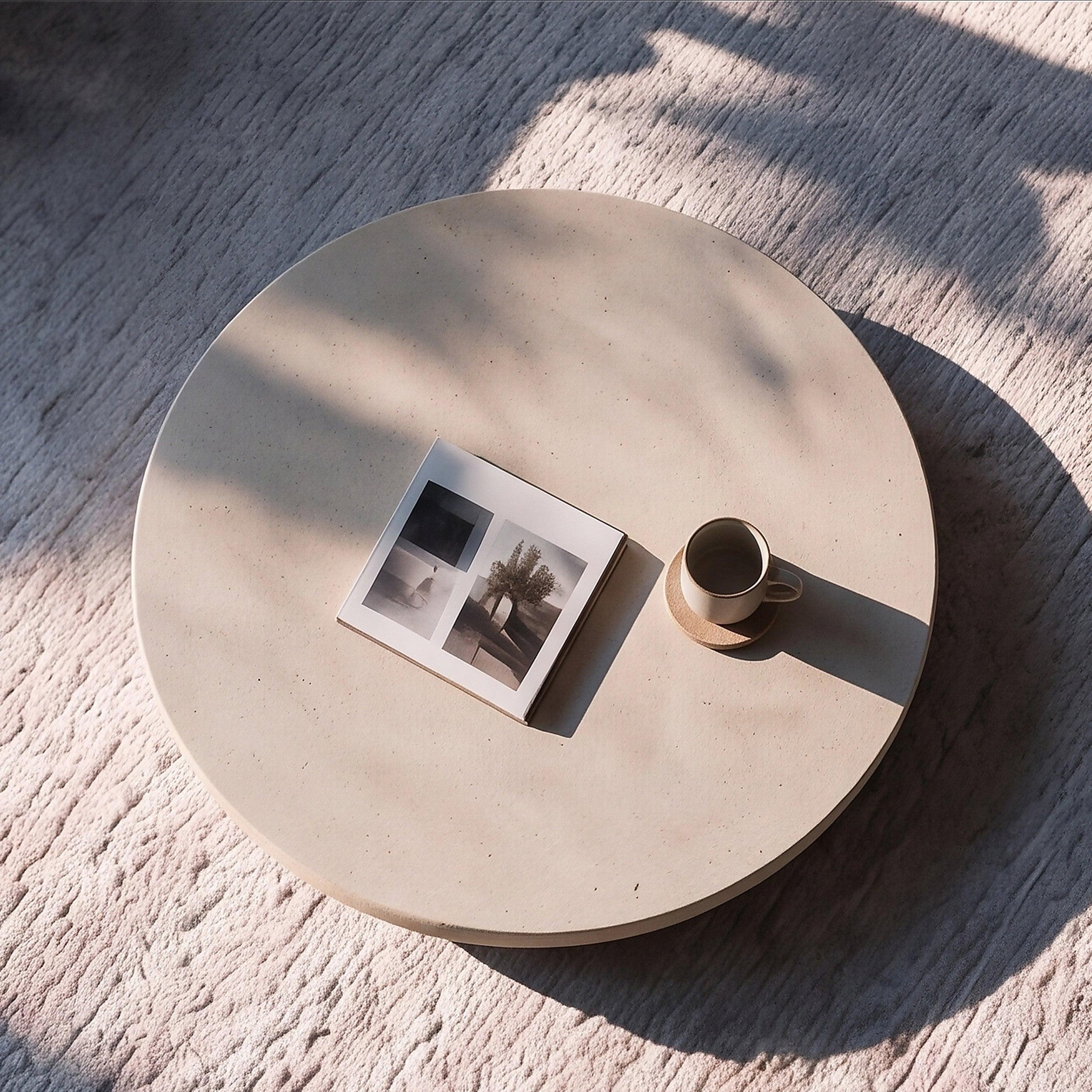 Voir la diapositive 6 : MAISON PAVANE Table basse ronde beige en fibre d'argile effet béton d100 cm-milos