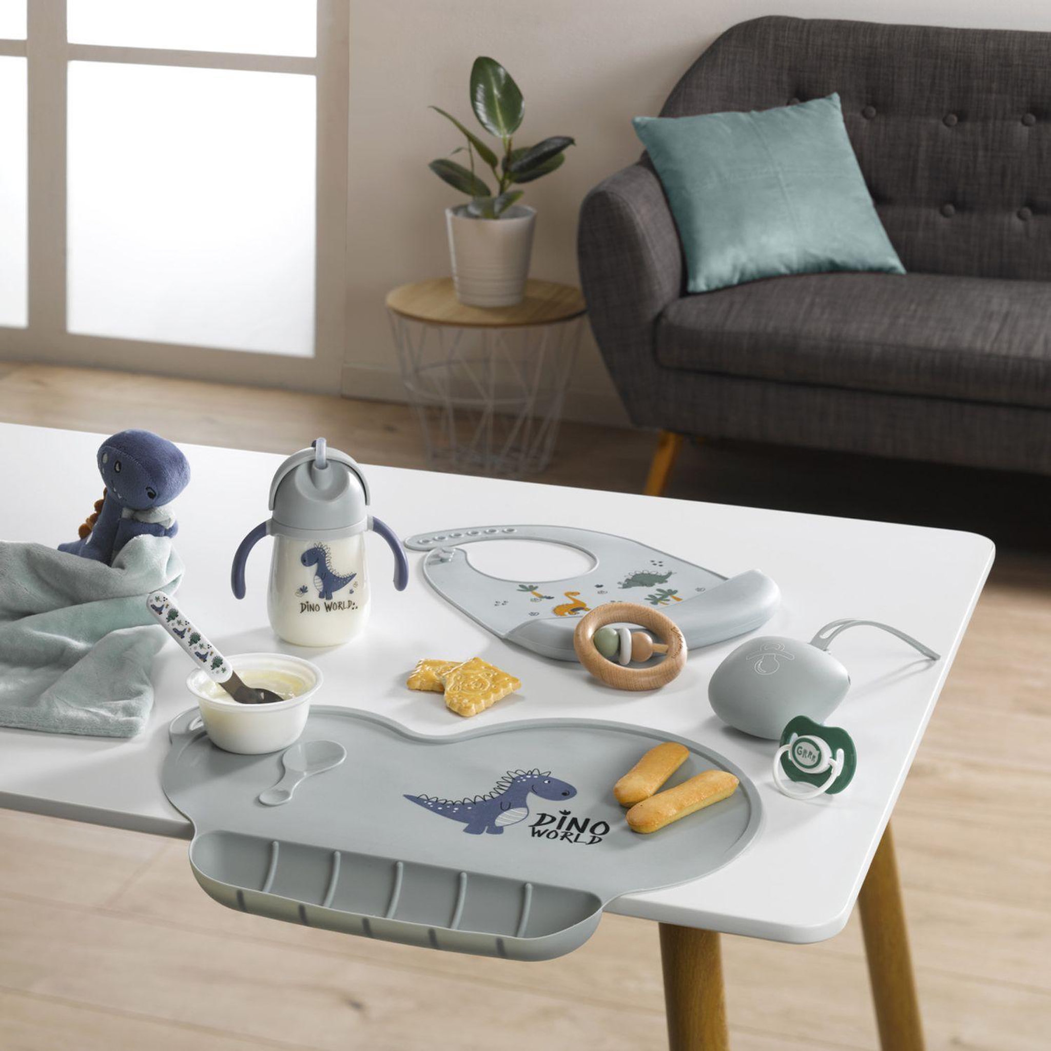 Voir la diapositive 2 : BEBE DOUCEUR Set de table enfant avec récupérateur - dinosaures