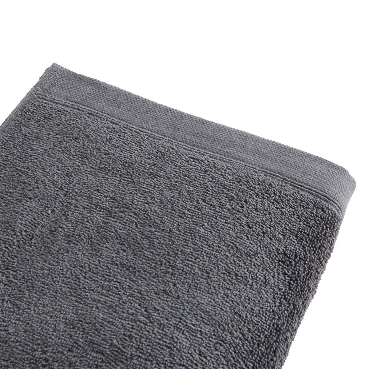 Serviette de toilette unie en coton 600 g/m²