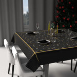SOLEIL D'OCRE Nappe festive imprimée anti-tâches FLOCONS, par Soleil d'Ocre. Coloris disponibles : Noir