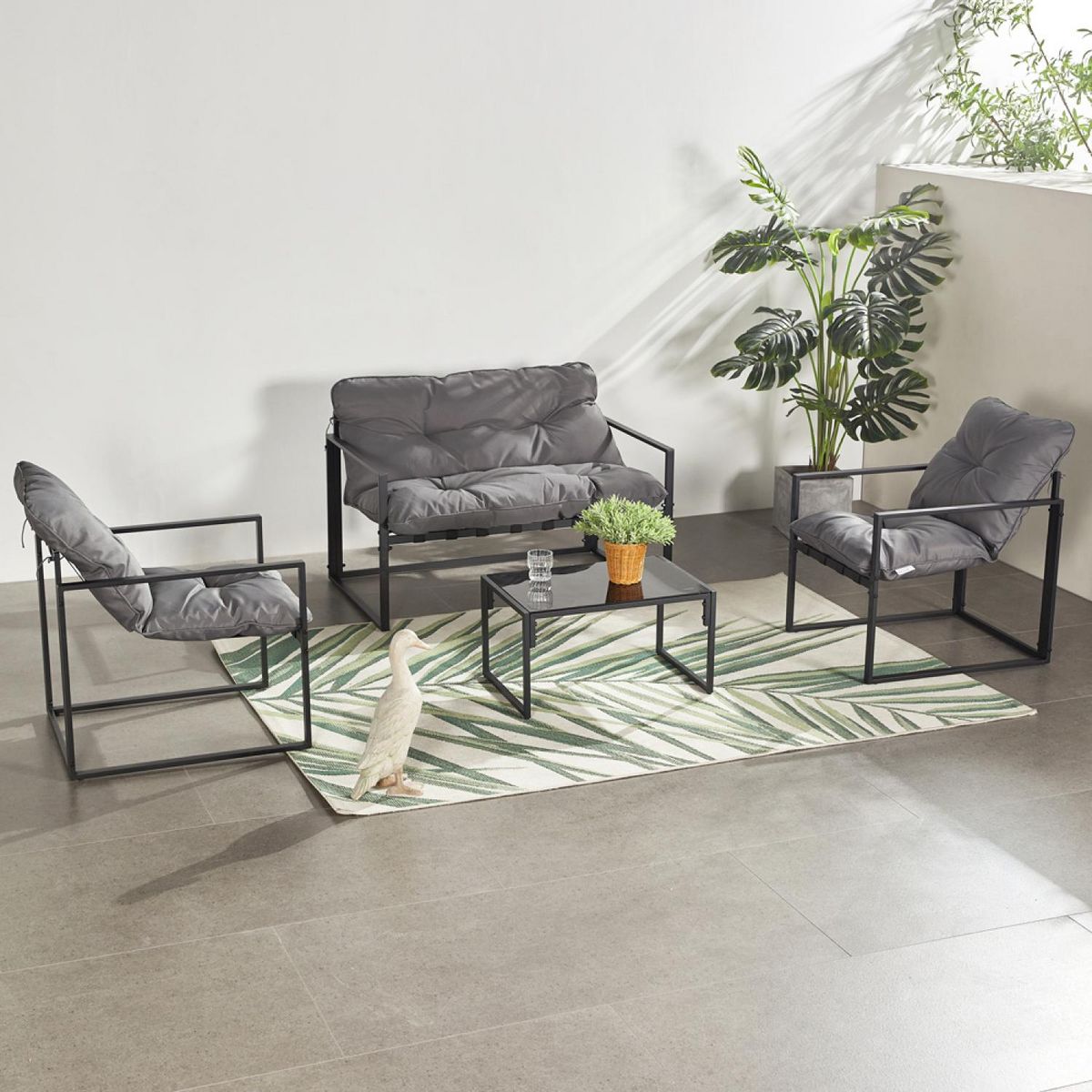 CONCEPT USINE Salon de jardin 4 places contemporain noir et coussins gris RABAT