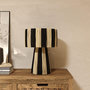 Voir la diapositive 2 : Rendez vous déco Lampe rayée noire en feuille de palmier-Soléa