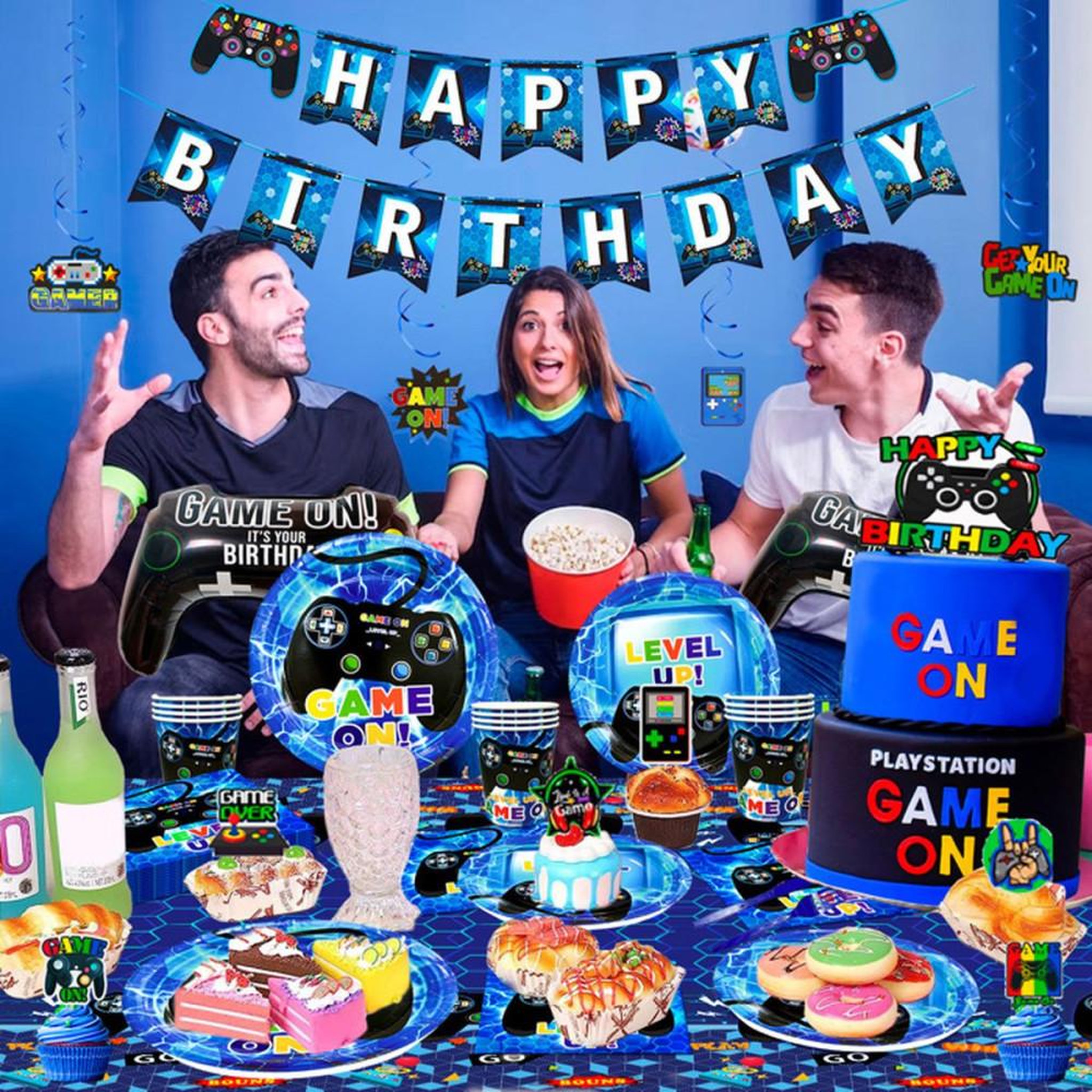Voir la diapositive 5 : Kit déco anniversaire jeux vidéo : bannière tissu, nappe, assiettes et gobelets, ballons aluminium, stickers et décorations gâteau