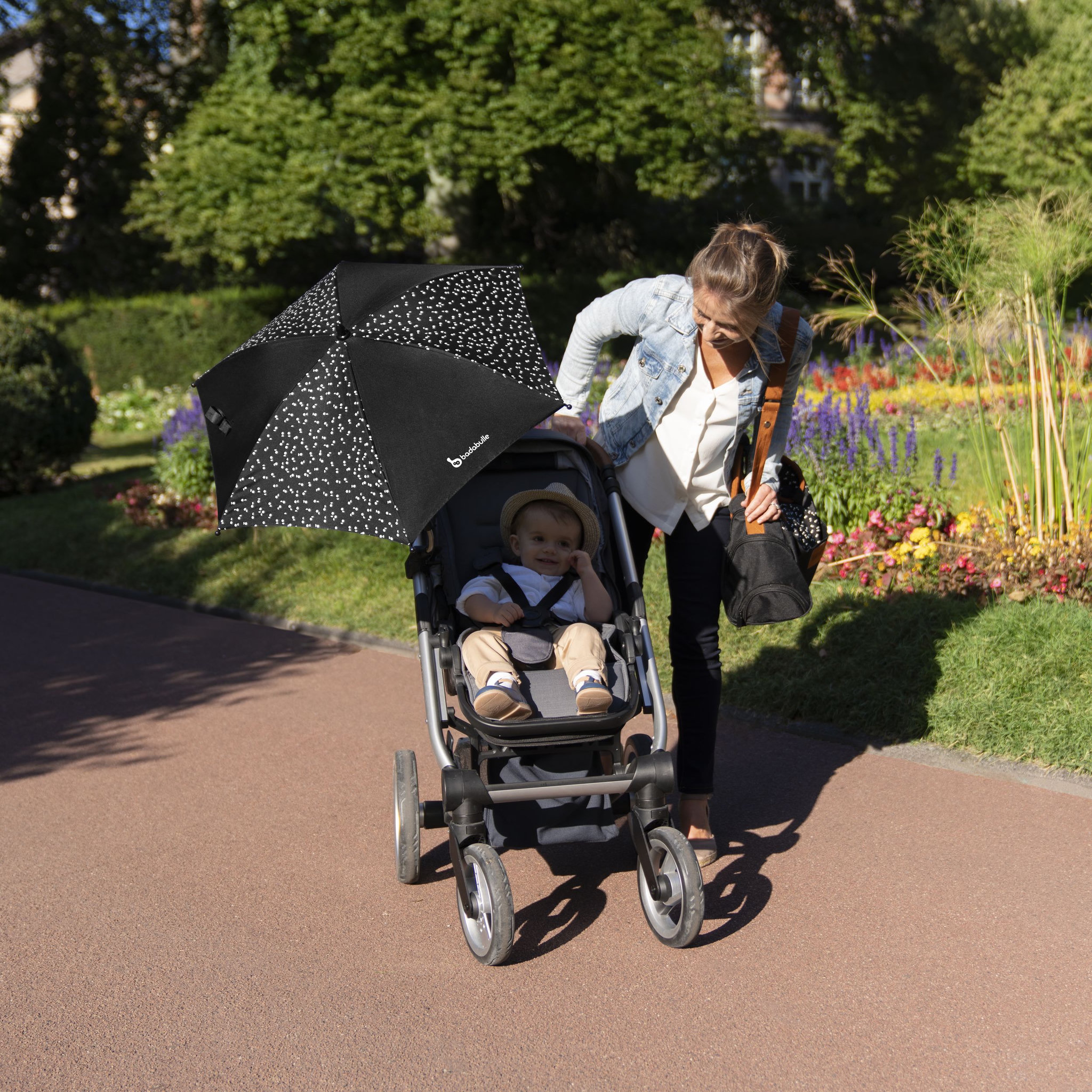 Voir la diapositive 4 : BADABULLE Ombrelle Anti-UV 50+ universelle noire