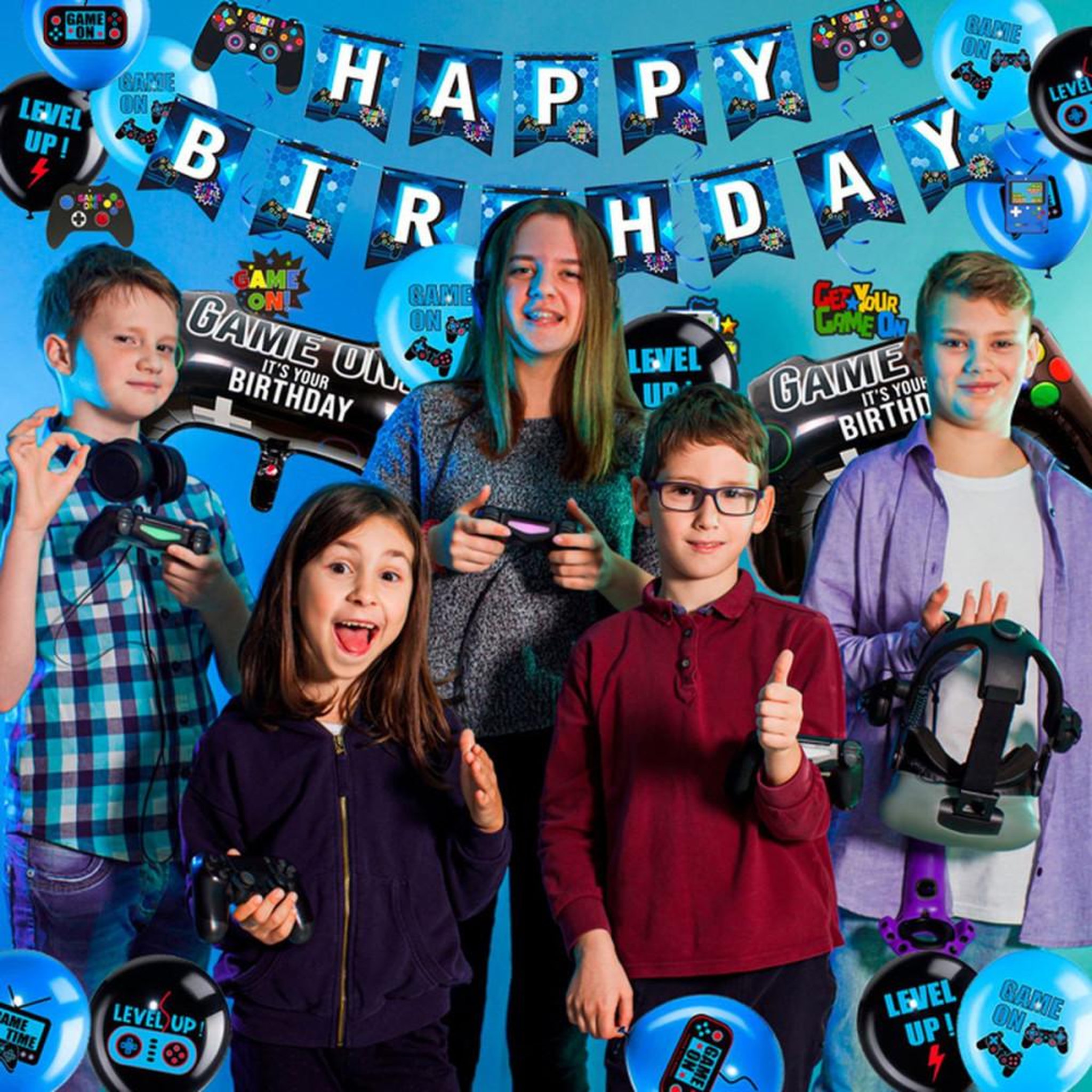 Voir la diapositive 3 : Kit déco anniversaire jeux vidéo : bannière tissu, nappe, assiettes et gobelets, ballons aluminium, stickers et décorations gâteau
