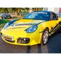 Smartbox Stage de pilotage junior : 2 tours de conduite au volant d'une Porsche Cayman - Coffret Cadeau Sport & Aventure