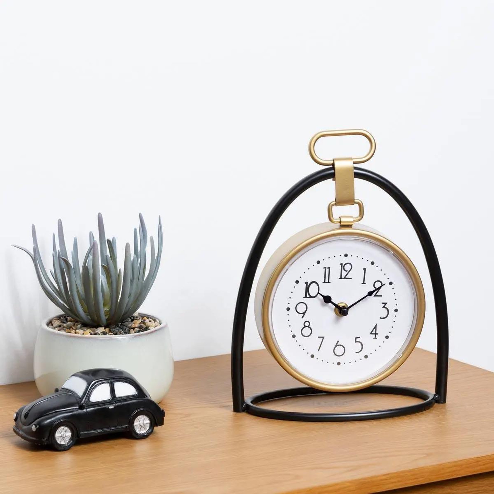 Voir la diapositive 2 : ATMOSPHERA Horloge à poser design  lona  27cm noir & or
