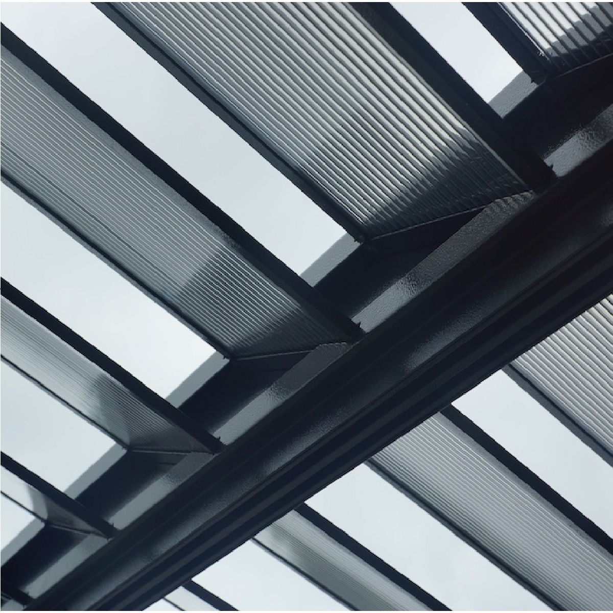 Pergola à toit et ventelles fixes