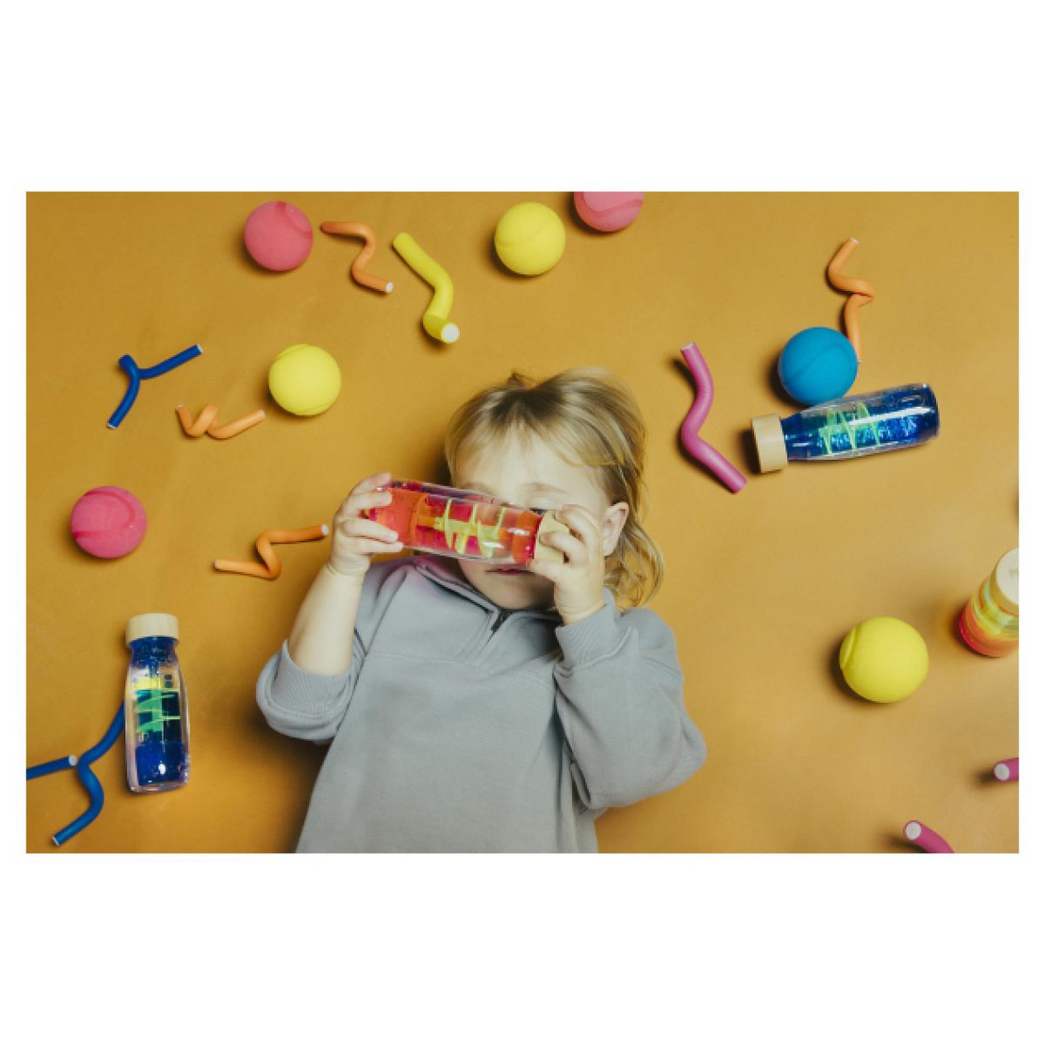 Voir la diapositive 2 : PETIT BOUM Bouteille sensorielle Move Spirale rose