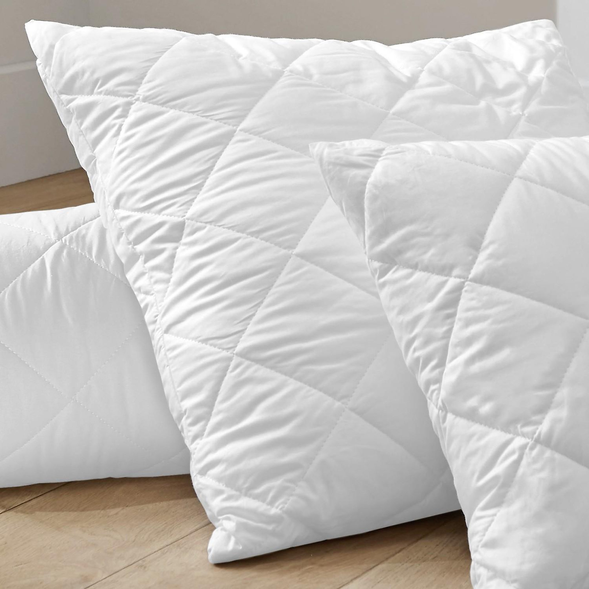 Les Ateliers du Linge Protège-oreillers 100%polyester 75gsm quilte. Coloris disponibles : Blanc