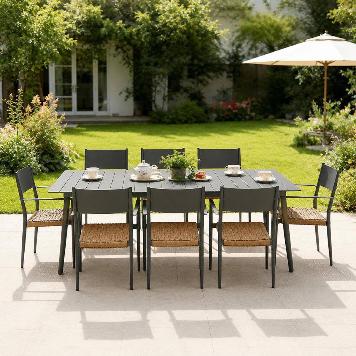 CONCEPT USINE Ensemble table de jardin 200 cm et 8 fauteuils gris foncé effet rotin CANBERRA