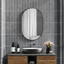 Voir la diapositive 2 : HOMCOM Miroir mural ovale dim. 60L x 90H cm cadre arrondi montage vertical/horizontal alu. noir