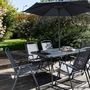 Voir la diapositive 2 : Oviala Salon  de jardin avec parasol - 6 places - Résine et verre - BORMES