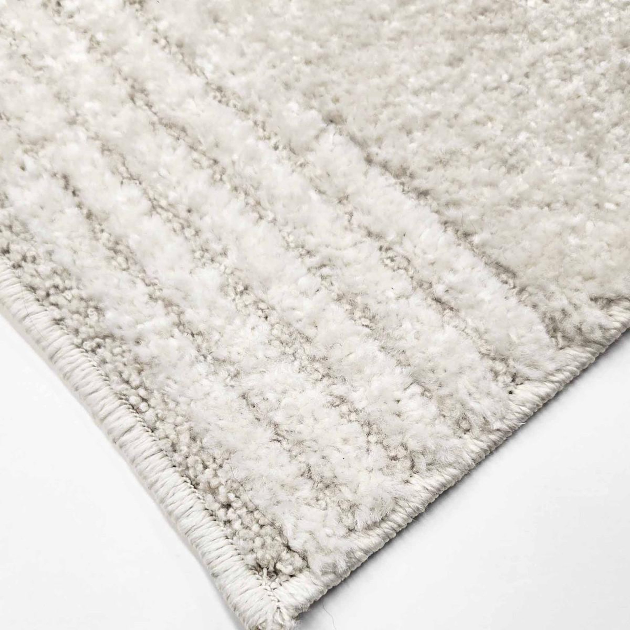 Voir la diapositive 2 : Douceur d'Intérieur Tapis déco en relief  jalisco  60x110cm naturel