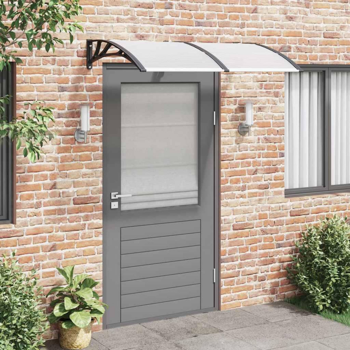 VIDAXL Auvent de porte Noir et transparent 150x75 cm Polycarbonate