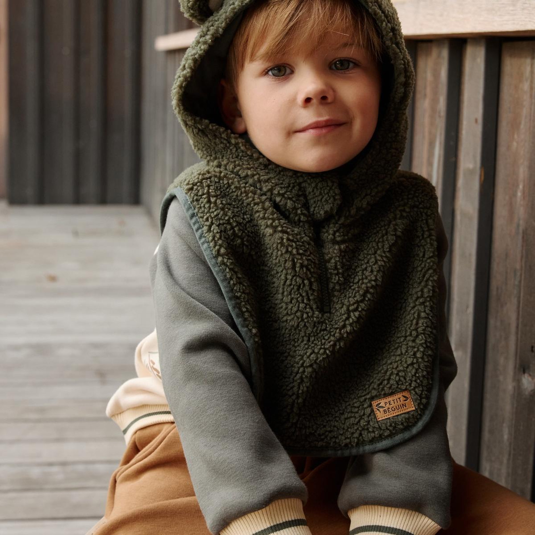 Voir la diapositive 5 : PETIT BEGUIN Capuche bébé en sherpa Ginkgo